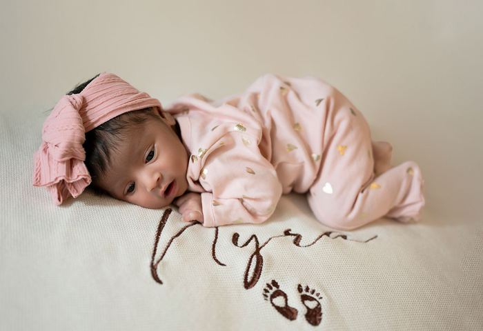 Newborn lifestyle portrait at home by Lilia Photography