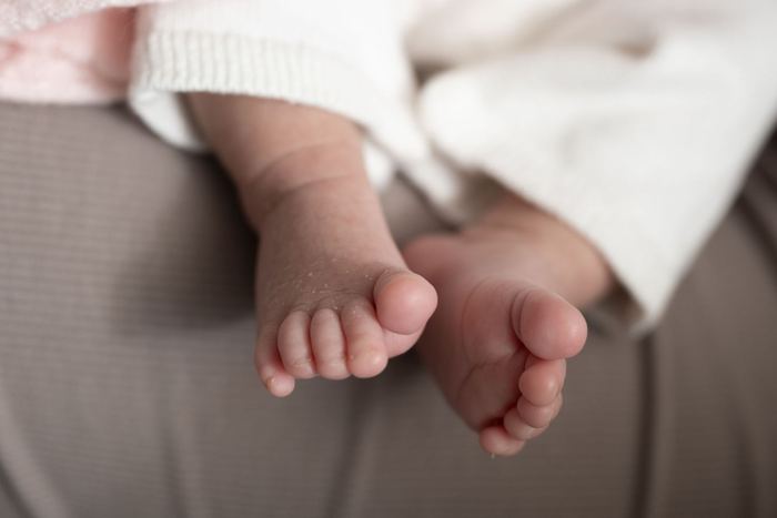 Newborn lifestyle portrait at home by Lilia Photography