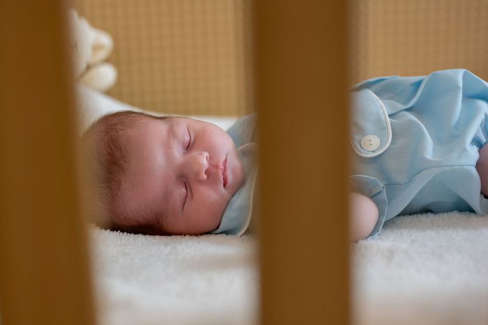 Newborn lifestyle portrait at home by Lilia Photography