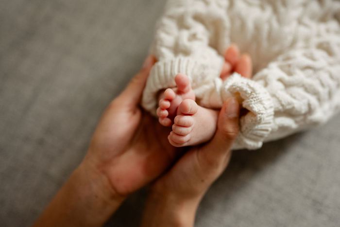 Newborn lifestyle portrait at home by Lilia Photography