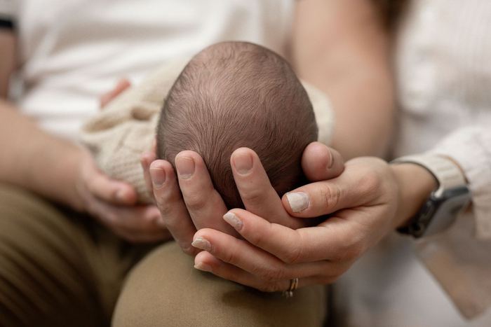 Newborn lifestyle portrait at home by Lilia Photography