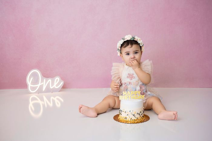 First birthday cake smash portrait by Lilia Photography