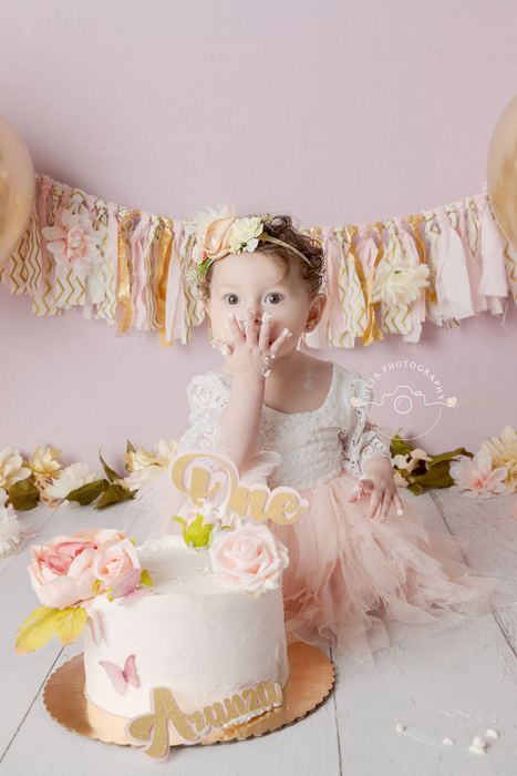 First birthday cake smash portrait by Lilia Photography